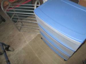 Sterilite storage bin on wheels and...