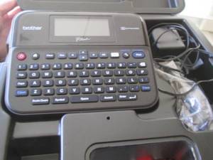 brother label maker with carrier ca...