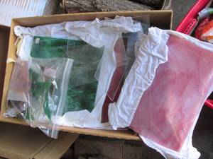 Box filled with stained glass pieces