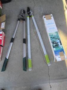 Lot of garden lopping shears and a sprayer