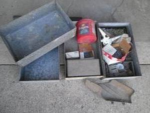 4 Metal boxed filled with nails and fasteners