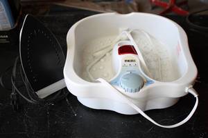 Foot bath and clothing iron...