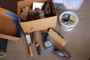 Box of tiling tools and supplies se...