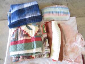 Various quilts and blankets...