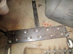 Metal pull behind lawn dethatcher...