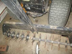 Metal pull behind yard aerator...