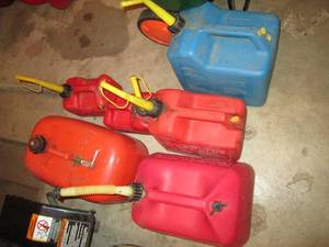 Collection of assorted gas cans wit...