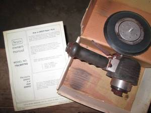Pneumatic sander in original box...