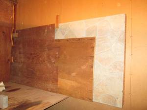 Partial sheets of plywood and a col...