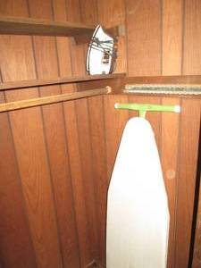 Vintage ironing board with iron...