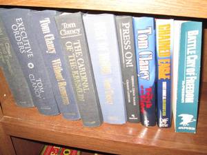 Assortment of large Tom Clancy book...