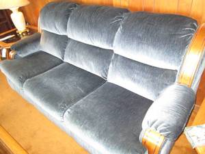 Deep blue upholstered 3-cushion sof...