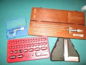 Machinist square, micrometer and mo...