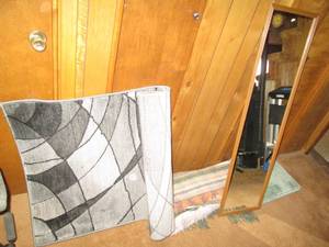 Variety of household rugs and runne...