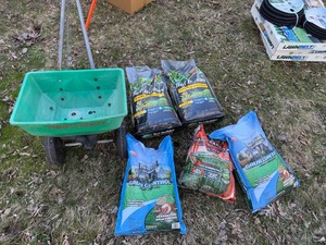 Red Devil Broadcast Spreader w Scotts & Menards Lawn Care Lot