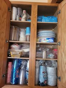 Assorted Party Supplies - Cups, Plates & Napkins in Cabinet