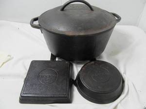 3-Piece Cookware Lot  Lodge 8IC Cast Iron Dutch Oven with Lid & Two Crofton 6 Cast Iron Skillets