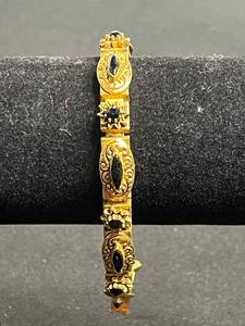 Florenza Gold-Tone Filigree Onyx Bracelet - Oval Black Onyx Accents
