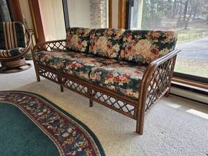 Rattan Frame Sofa with Floral Upholstery Cushions