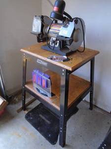 Craftsman 8� grinderbrass wheel variable speed on stand. As shown.