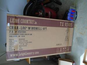 9 char log windmill. New in box. As shown.