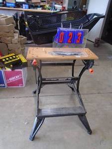 Workmate 200 folding stand with clamps. As shown.