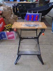 Workmate 200 folding stand with clamps. As shown.