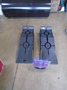 Pair of Rhino plastic car ramps. As shown.