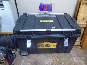 Dewalt rolling storage box. 39 x 23 x 24 with contents. As shown.