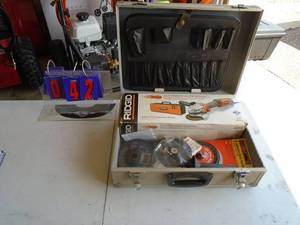 Rigid angle grinder with accessories.