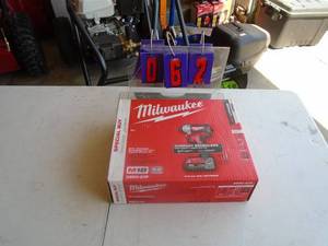 New in box Milwaukee M18 14� impact with battery & charger. As shown.