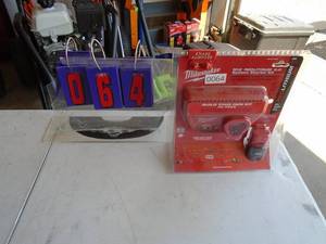 New in box Milwaukee M12 battery & charger. As shown.