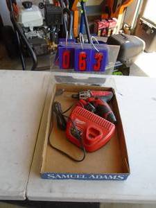 Milwaukee M12 driver with 2 batteries & charger. As shown.