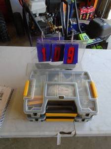 Qty of 2 organizer boxes with contents. As shown.