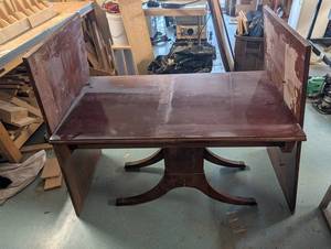 Dark Wood Table with Curved Pedestal Base