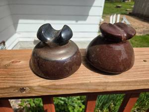 Brown ceramic or porcelain electrical insulators