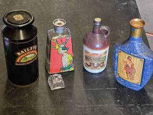 Baileys Irish Cream Tin, Beams Choice Whiskey Bottle, Jug Wine Bottle, and 1800 Tequila Bottle