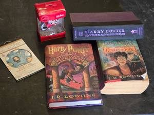 Harry Potter Books and Memorabilia Collection including Sorcerers Stone and Goblet of Fire, Sticker Pad, and Ornament