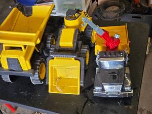 Toy Construction Vehicles Including Dump Truck, Front Loader, and Crane Truck