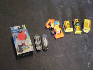 Beyblade Launcher, Tech Deck Fingerboards, and Tonka Toy Construction Vehicles