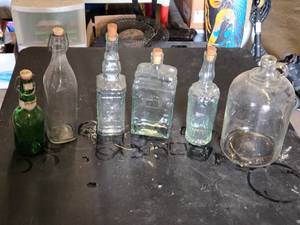 Collection of Vintage Glass Bottles and Jars