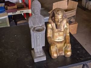 Buddha and Egyptian Pharaoh Statues