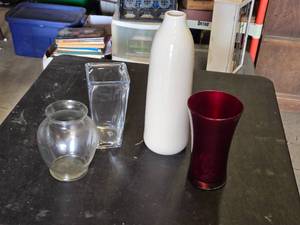 Vases and Decorative Containers Including Tall White Vase, Red Vase, and Clear Glass Vases