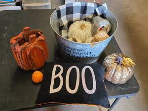 Halloween and Fall Themed Decorations including Metal Bucket, Decorative Pumpkins, and Boo Pillow