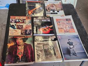 Collection of Guitar Music Books including John Mayer, Led Zeppelin, and Jimi Hendrix