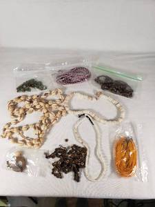 Assorted Jewelry and Beads Lot Including Shell Necklaces and Beaded Strands