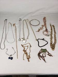 Mixed Jewelry Collection including Necklaces, Bracelets, and Pendants