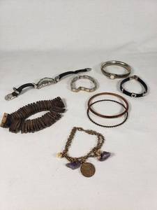 Assorted Bracelets and Bangles Jewelry Collection including Beaded, Metal, and Leather Designs