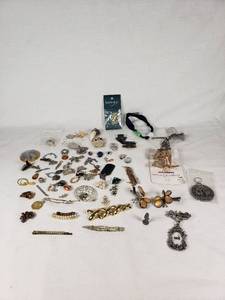 Assorted Jewelry Lot Including Vintage Brooches, Pendants, and Charms