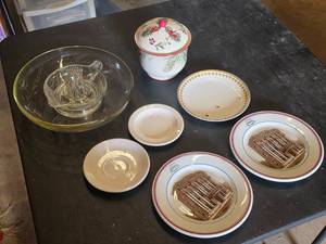 Set of Vintage plates featuring buildings with I.O.O.F. and 1914 markings , Glass Juicer, and Christmas-Themed Jar